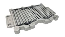 Fig 3.- Cut section of an optimized liquid-cooled heat exchanger printed without supports on 3D Systems’ DMP Flex 350 Dual using LaserForm AlSi7Mg0.6 (A) material saving 83% space and eliminating 97 parts compared with a conventional air-cooled heat sink. Fig 3.- Cut section of an optimized liquid-cooled heat exchanger printed without supports on 3D Systems’ DMP Flex 350 Dual using LaserForm AlSi7Mg0.6 (A) material saving 83% space and eliminating 97 parts compared with a conventional air-cooled heat sink.