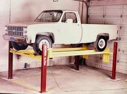 BendPak’s first car lift, circa 1983. It was a fully mechanical lift with chains, sprockets, and a single large electric motor for the drive system. After selling about 200, the company discontinued this model in favor of simpler hydraulic/chain-driven designs. BendPak’s first car lift, circa 1983. It was a fully mechanical lift with chains, sprockets, and a single large electric motor for the drive system. After selling about 200, the company discontinued this model in favor of simpler hydraulic/chain-driven designs.