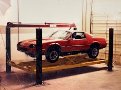 As muffler shops were trying to diversify their services, BendPak introduced this four-post lift with a wheels-free design around 1986 to facilitate wheel and tire repair.