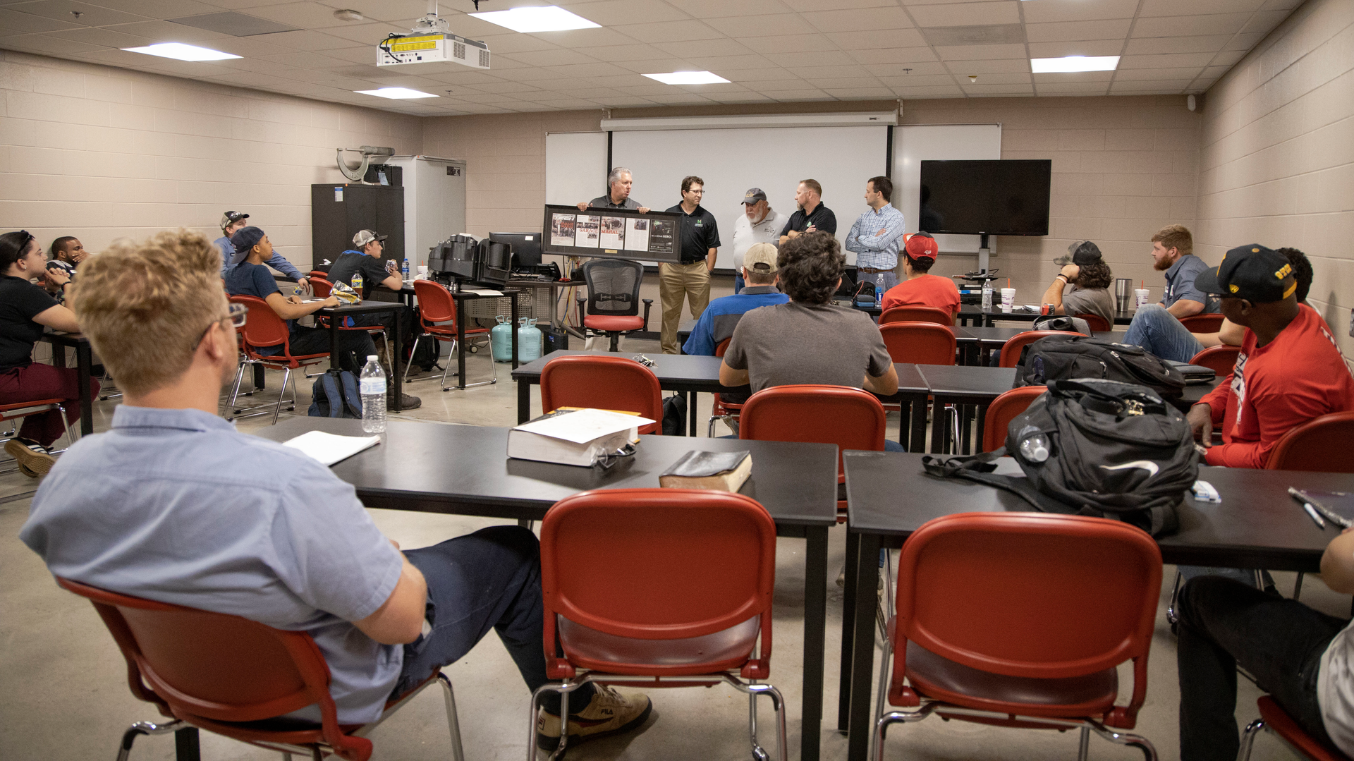 Volumes Noregon Marketing Images Company Events2019 07 Gtcc Presenting Framed Article To Bill Yokley Final Jp Gs Img 3419 601839016b850 63459685d4a60