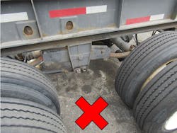 The red X shows where technician in the second incident was trapped and crushed by the rollaway chassis’ wheels. The red X shows where technician in the second incident was trapped and crushed by the rollaway chassis’ wheels.