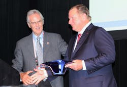P.S.I. President and CEO Tim Musgrave presented an award to Harold Sumerford, Jr., American Trucking Associations immediate past chairman and J&amp;M Tank Lines CEO, in honor of his service to the trucking industry on Nov. 9 in San Antonio.