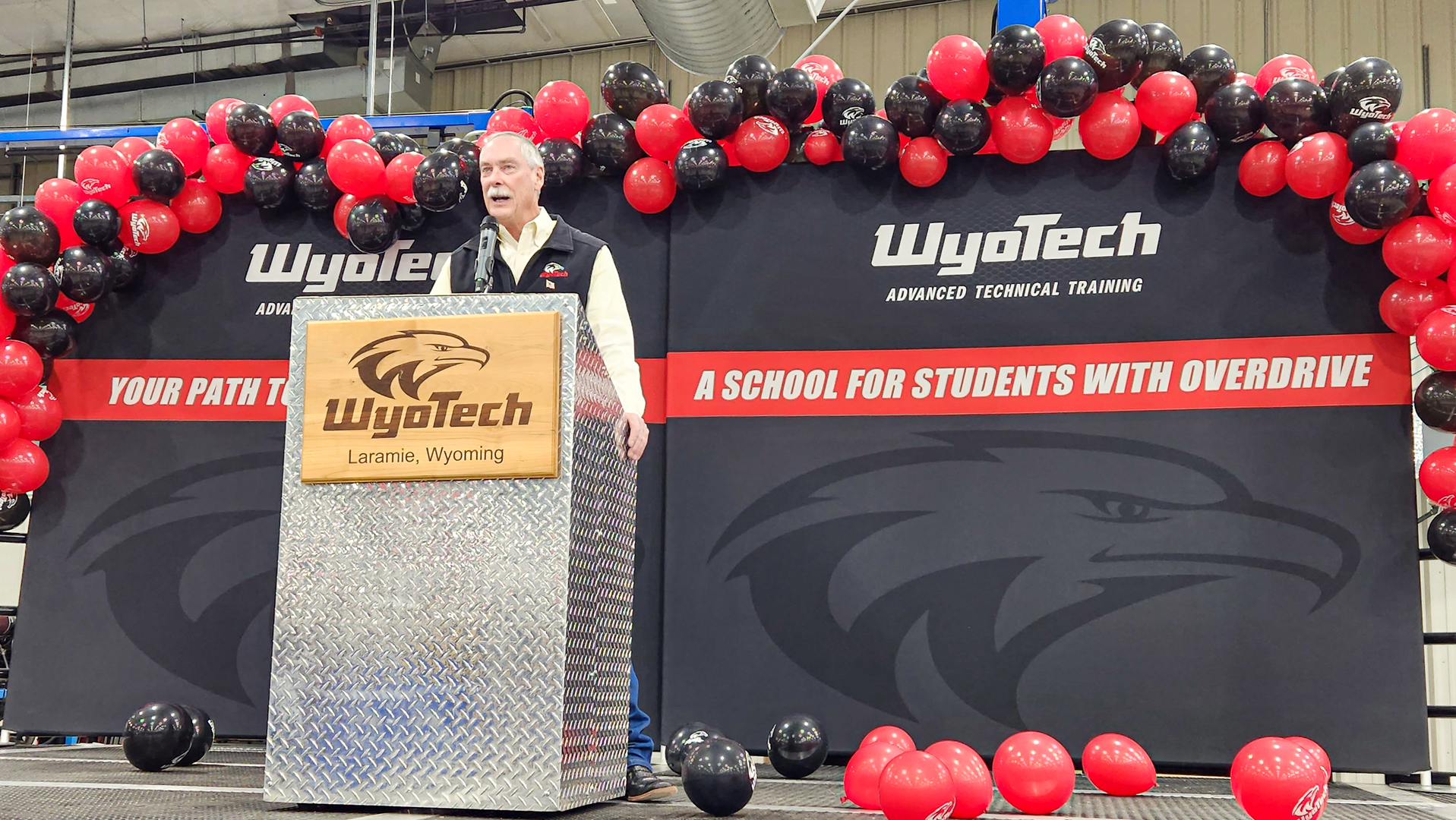 WyoTech CEO Jim Mathis gives a speech as the auto and diesel school celebrates its 90,000-sq.-ft. expansion.
