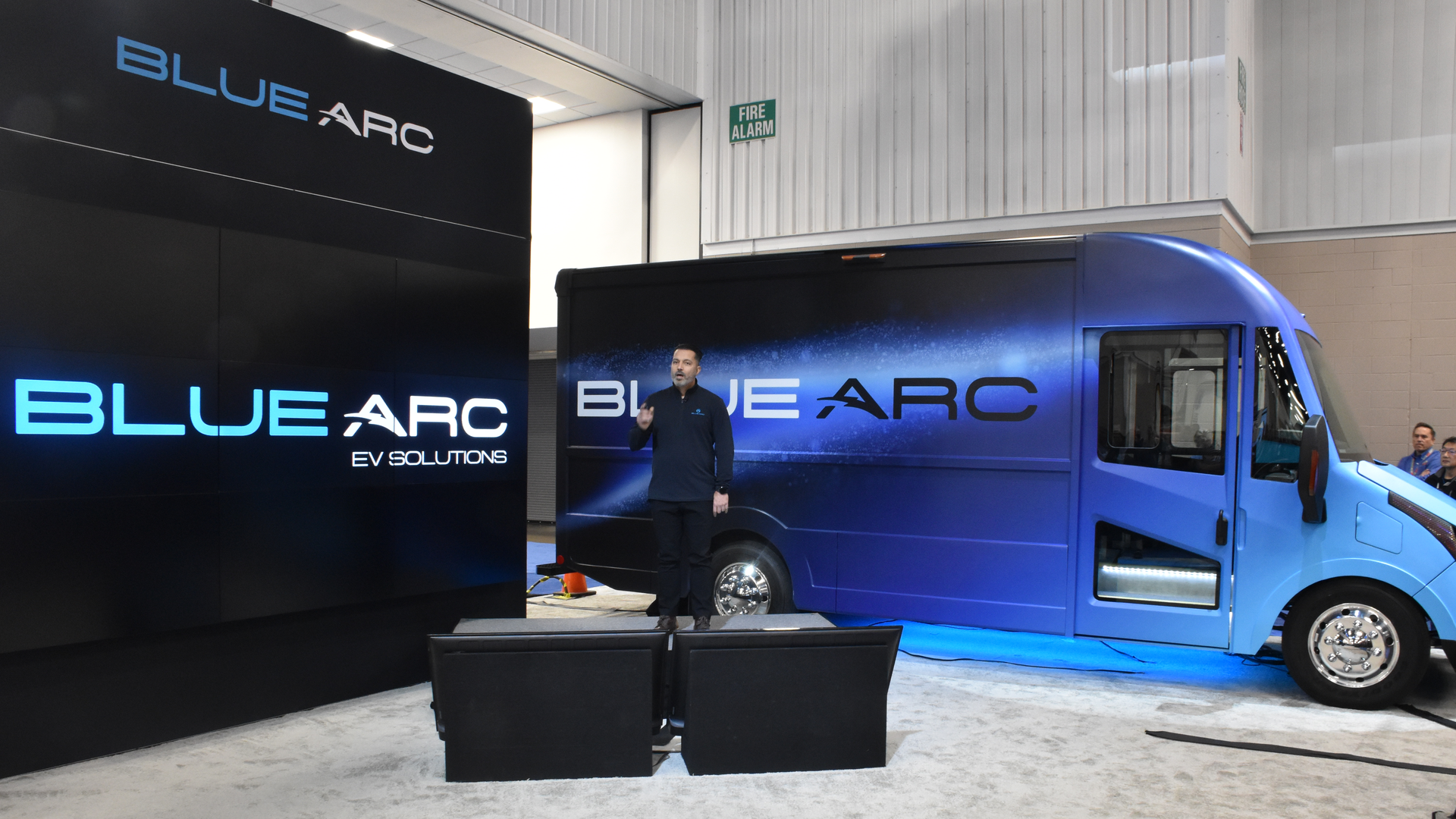 Eric Fisher, VP and general manager of Blue Arc EV Solutions, introduces The Shyft Group&rsquo;s Blue Arc all-electric Class 3 delivery van at last year&rsquo;s Work Truck Show.