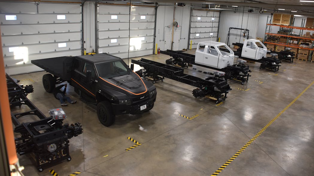 These early Zeus Z-19 Class 5 cab chassis demonstration units illustrate the various stages of assembly at the Zeus Electric Chassis Inc. shop.