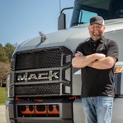 Hellbent Xpress owner Jamie Hagen with one of his 12 trucks. Hellbent Xpress owner Jamie Hagen with one of his 12 trucks.