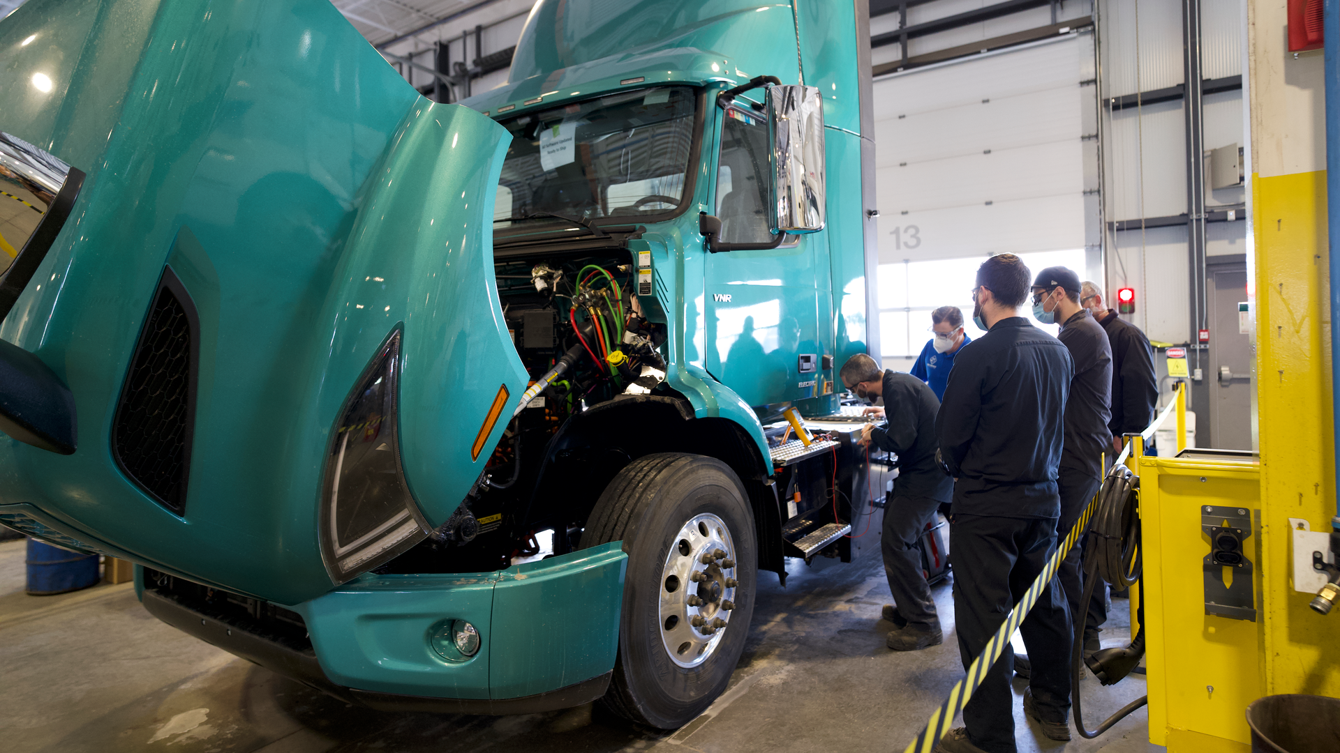 Technicians at Camions Volvo Montreal complete their required training on the Volvo VNR Electric as part of the Volvo Trucks EV Certified dealership designation.