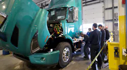 Technicians at Camions Volvo Montreal complete their required training on the Volvo VNR Electric as part of the Volvo Trucks EV Certified dealership designation.