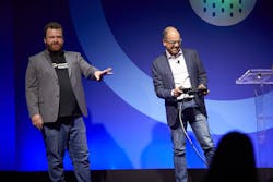 Polymath Robotics CEO and co-founder Stefan Seltz-Axmacher (left) guides Samsara CEO Sanjit Biswas through tele-operating a farm tractor. Polymath is a participant in the new Samsara Ventures program, which provides $50,000-$100,000 in seed money to companies using Samsara's platform. Polymath Robotics CEO and co-founder Stefan Seltz-Axmacher (left) guides Samsara CEO Sanjit Biswas through tele-operating a farm tractor. Polymath is a participant in the new Samsara Ventures program, which provides $50,000-$100,000 in seed money to companies using Samsara's platform.