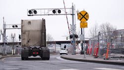 Truck at railroad stop Truck at railroad stop