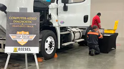 Cox Automotive Mobility technician at testing station during the Top Tech competition.
