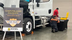 Cox Automotive Mobility technician at testing station during the Top Tech competition. Cox Automotive Mobility technician at testing station during the Top Tech competition.