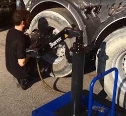 By placing the arm on a trolley cart with a compressor, the technician can easily move the tool around the vehicle and from station to station safely without the hazard of hoses trailing behind them. By placing the arm on a trolley cart with a compressor, the technician can easily move the tool around the vehicle and from station to station safely without the hazard of hoses trailing behind them.