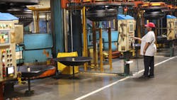 An employee manages uncured 'green' tires at Yokohama Tire Manufacturing Mississippi (YTTM) An employee manages uncured 'green' tires at Yokohama Tire Manufacturing Mississippi (YTTM)