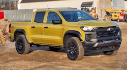 Nitro Yellow paint and edgy styling seem appropriate for a work site. The Colorado is about 10 percent smaller than a GMC Sierra (inset) or its Chevy Silverado twin, so it is easier to maneuver in everyday driving. Depending on equipment, a mid-size truck also costs $10,000 to $20,000 less.