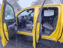 Seen through a snow shower, the four-door crewcab is the only cabin available in the Colorado and GMC Canyon. The floor is 22 inches high, making entry difficult for short-legged people. All-black interior includes cloth seat covers and hard plastic panels. Seen through a snow shower, the four-door crewcab is the only cabin available in the Colorado and GMC Canyon. The floor is 22 inches high, making entry difficult for short-legged people. All-black interior includes cloth seat covers and hard plastic panels.