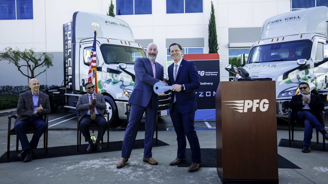 Jeff Williamson, PFG SVP of operations and Parker Meeks, Hyzon CEO, during the celebration of PFG&apos;s hydrogen fuel cell electric truck delivery.