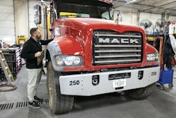 Housby always makes sure to perform quality checks, such as on this Mack's repaired fender, to eliminate the potential for a comeback. Housby always makes sure to perform quality checks, such as on this Mack's repaired fender, to eliminate the potential for a comeback.