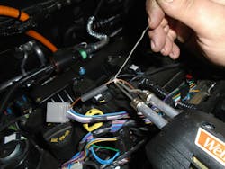 Figure 2 — This shows the solder starting to melt and flow over the wire. Figure 2 — This shows the solder starting to melt and flow over the wire.