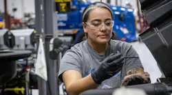 female_mechanic_checking_oil_2682_6240x4160