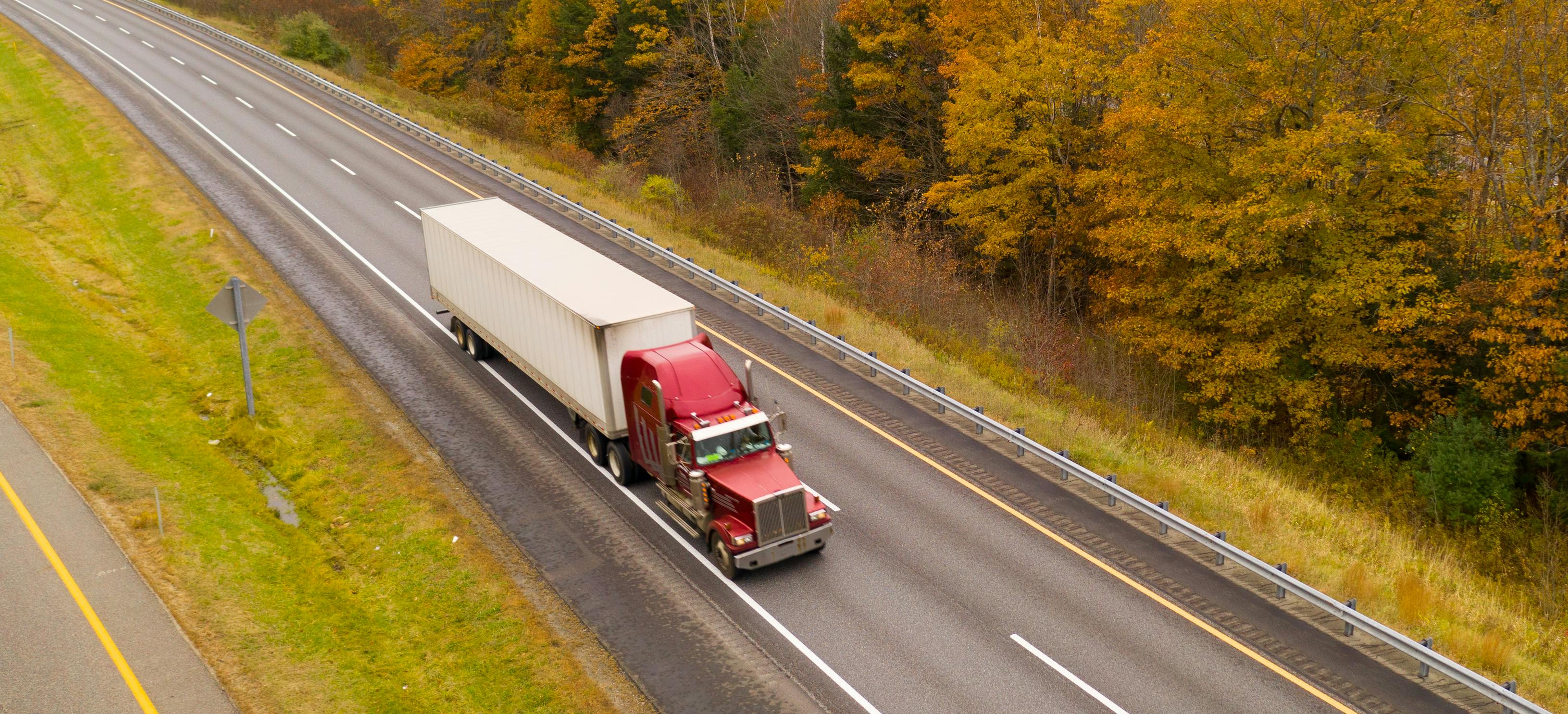 Tractor-trailer in autumn