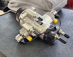 A new fuel pump, with opposing pistons, better balances its camshaft. A new fuel pump, with opposing pistons, better balances its camshaft.