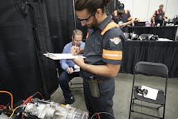 Jose Feliciano, runner-up in the heavy-duty category, has been a Top Tech champion or runner-up for 7 consecutive years. Jose Feliciano, runner-up in the heavy-duty category, has been a Top Tech champion or runner-up for 7 consecutive years.