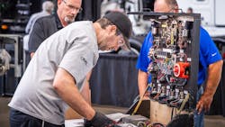 Warren Smith figures out an electrical issue at the 2024 Ryder Top Tech skills competition. He ended up winning the competition. Warren Smith figures out an electrical issue at the 2024 Ryder Top Tech skills competition. He ended up winning the competition.