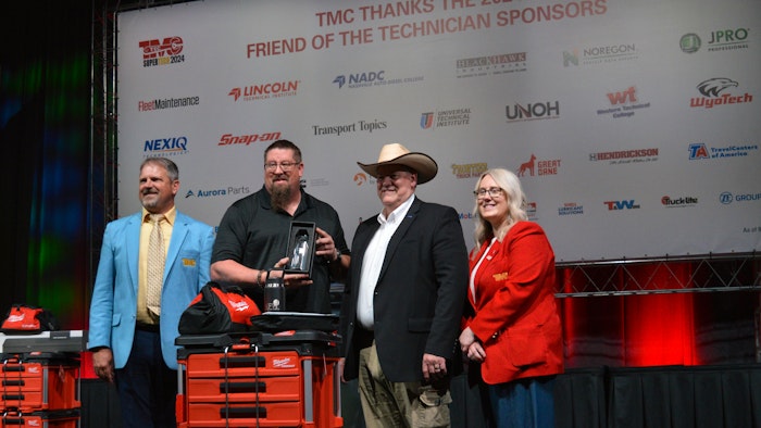 From left to right: Benjamin Phillips, Technician & Educator Committee Chairman, Doug Nickles, Grand Champion and FedEx Freight technician, Randy Patterson, TMCSuperTech Competition Chairman, and Amanda Schuier, TMC Chairman