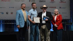 Aven Blozan, diesel technician at Iron Buffalo in Denver, CO, on stage with his award for taking 1st place in the Aftertreament Mechanical station in the 2024 TMCSuperTech competition Aven Blozan, diesel technician at Iron Buffalo in Denver, CO, on stage with his award for taking 1st place in the Aftertreament Mechanical station in the 2024 TMCSuperTech competition