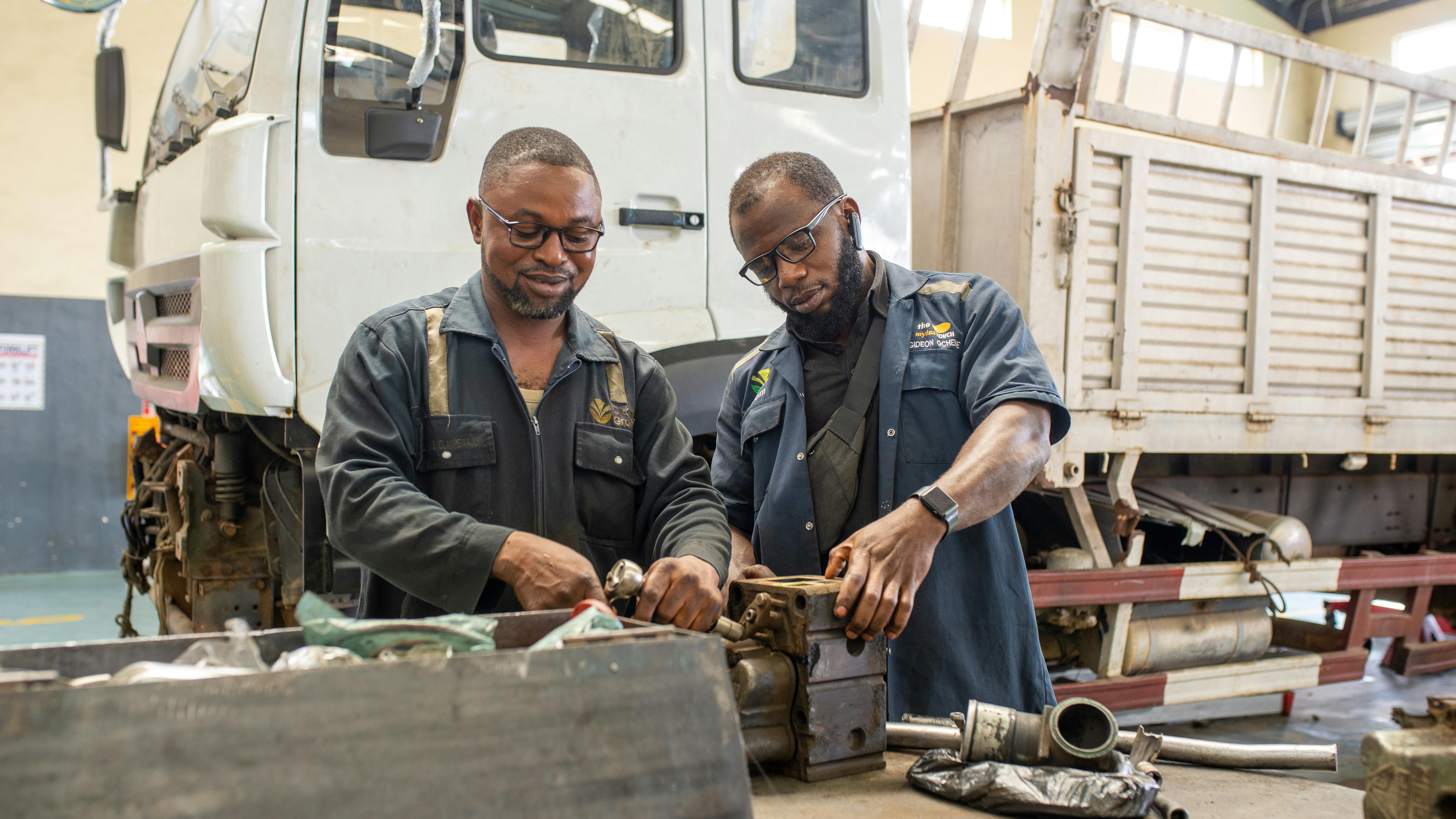 6740e0070af0edd43335fca2 Man On Left Jimoh Olarenwaju Man On Right Gideon O