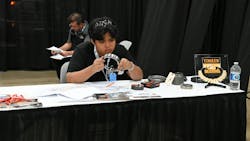 Dan Escalona, a Rising Star contestant, works at the Timken station. Dan Escalona, a Rising Star contestant, works at the Timken station.