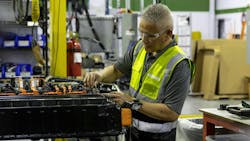 Cox Automotive Battery Solutions Worker Cox Automotive Battery Solutions Worker