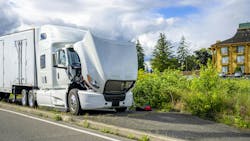 downed-truck-at-roadside-dreamstime downed-truck-at-roadside-dreamstime