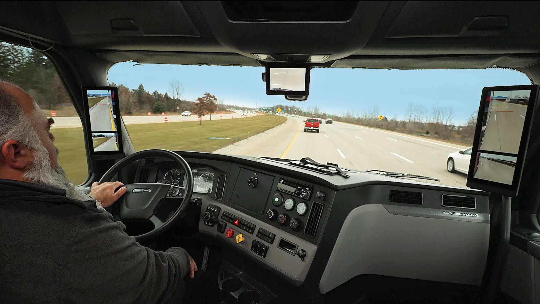 The MirrorEye A-pillar monitors display what you&rsquo;d see in traditional mirrors, while the center monitor covers the blind spot between on the passenger side, front bumper, and rear wheel well, explained David Kracirik, Stoneridge director of NA fleet sales.