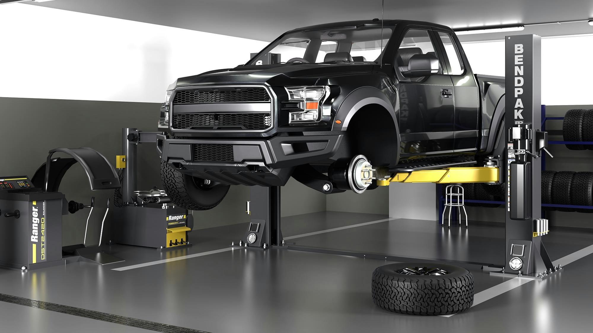 bendpak_12ap-srt_two-post_lift_in_tire_shop