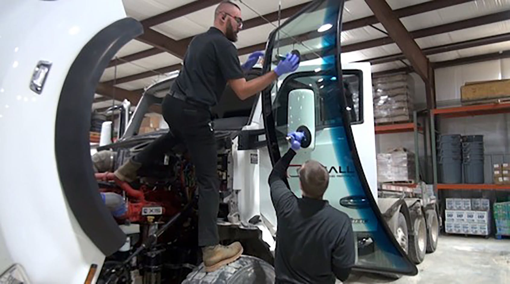 Standing on tires has caused many injuries to big truck windshield installers.