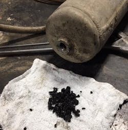 Oil in the air dryer system creates coke carbon, which forms into black crystals. Oil in the air dryer system creates coke carbon, which forms into black crystals.