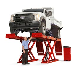 Hunter's RX14 scissor alignment rack was lengthened by 13' to accommodate longer wheelbases and speed up service. Hunter's RX14 scissor alignment rack was lengthened by 13' to accommodate longer wheelbases and speed up service.