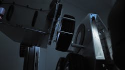 The gantry robot takes wheels of the axle and places them on a tire rack and then grabs the new tire/wheel assembly and quickly installs it. The gantry robot takes wheels of the axle and places them on a tire rack and then grabs the new tire/wheel assembly and quickly installs it.