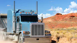 A semi in an arid desert A semi in an arid desert