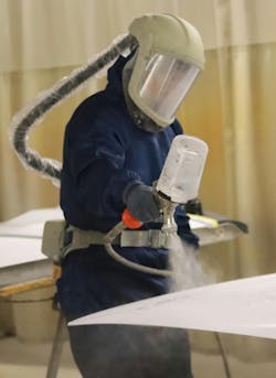 Body shop Fleet Fast makes sure technicians' PPE is always suited for the job. Using the paint sprayer, for example, requires an airtight mask to keep the user from inhaling toxic fumes. Body shop Fleet Fast makes sure technicians' PPE is always suited for the job. Using the paint sprayer, for example, requires an airtight mask to keep the user from inhaling toxic fumes.