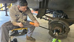 Transport Services tech using Lang Brake Spring tool Transport Services tech using Lang Brake Spring tool