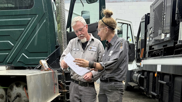 Missy Albin works with mentor Joe Dougherty