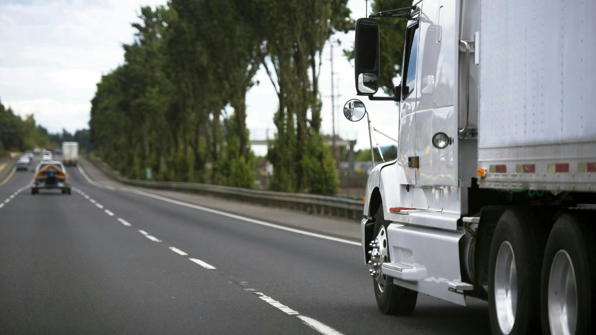 Dreamstime white semitruck driving on road