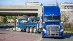 Semi truck being towed Semi truck being towed