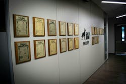 Great Dane's patents in a hallway Great Dane's patents in a hallway