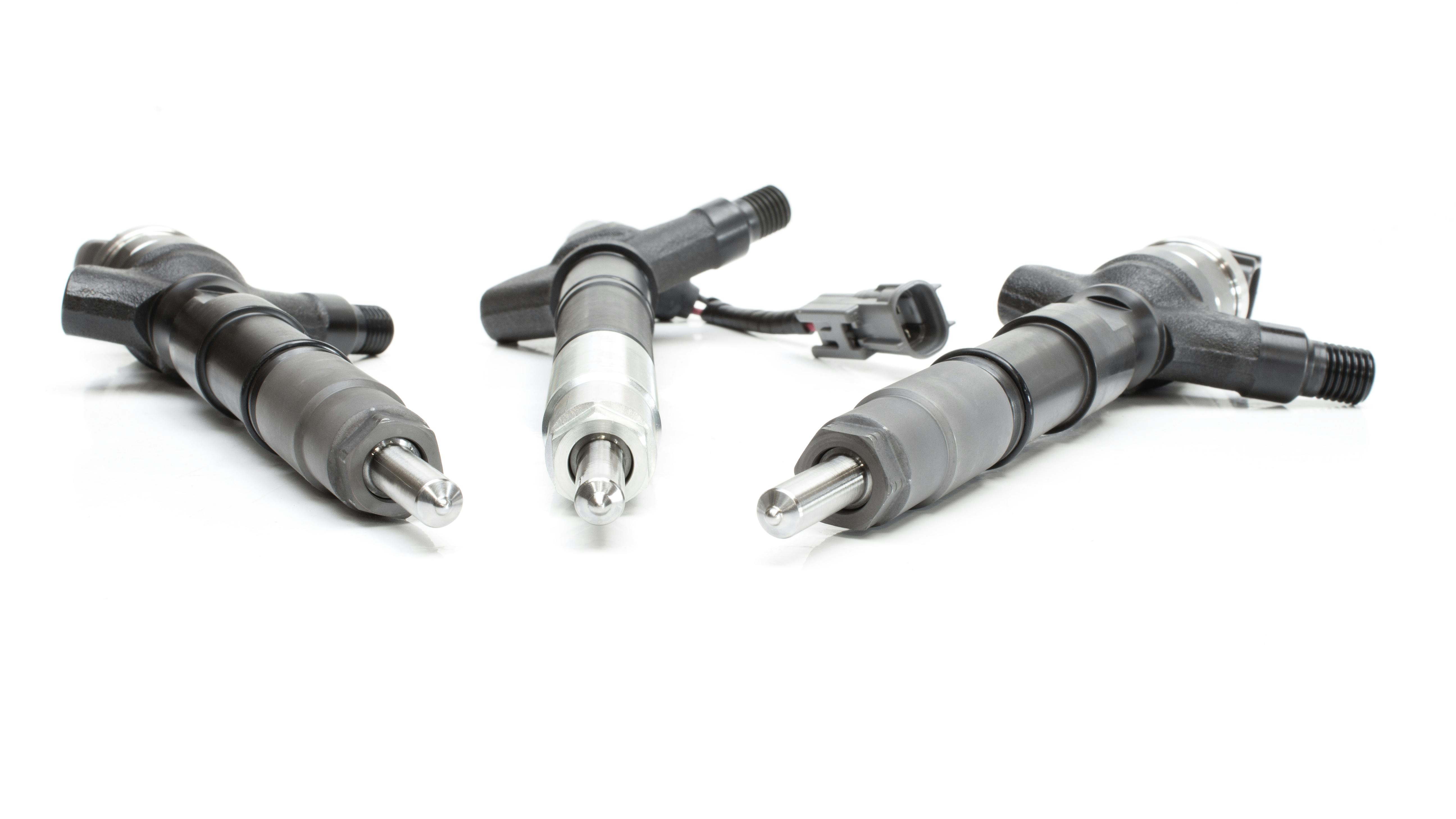 Diesel fuel injectors with new nozzles