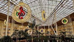 The halls were decked in Nashville's Gaylord Opryland Resort & Convention Center, with larger-than-life Christmas trees, wreaths, and lit ornaments dangling from the ceiling. The halls were decked in Nashville's Gaylord Opryland Resort & Convention Center, with larger-than-life Christmas trees, wreaths, and lit ornaments dangling from the ceiling.