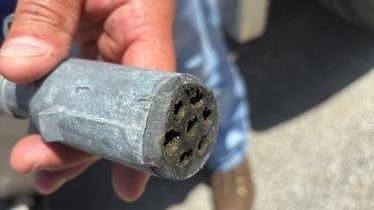 The next-gen tractor-trailer connectors need to be durable, since they work in harsh environments and risk getting dropped or run over in the lot.